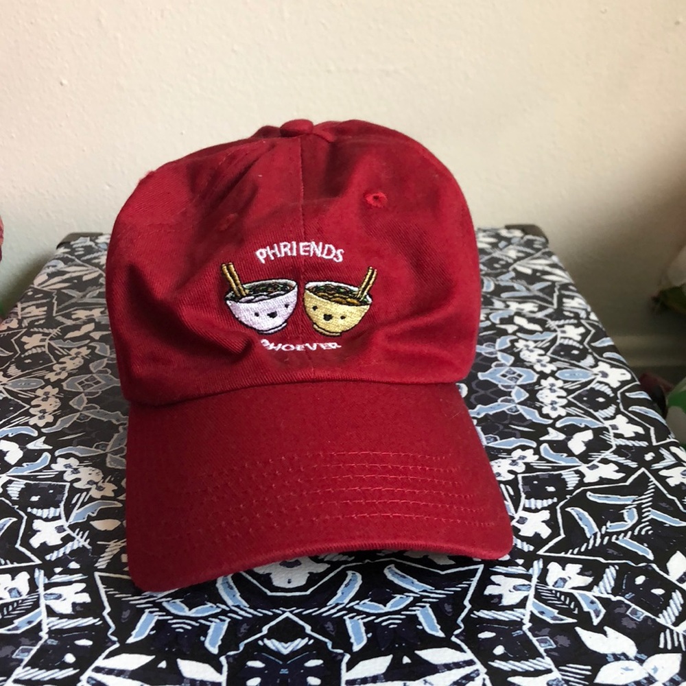 Stitched red hat with adjustable back
